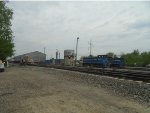 Looking East at Yard, Building & Track Equipment &  Azcon GMTX Switcher 75 & 13